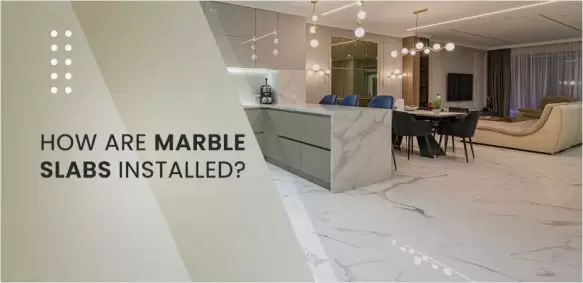 How are marble slabs installed?