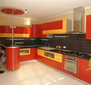 Modular Kitchen with yellow-orange shades for a stylish look