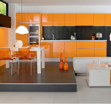 Modular Kitchen Design with orange shades for a stylish look