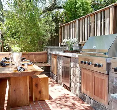 Outdoor kitchen design with seating arrangement