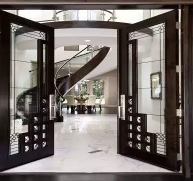 Delicate glass main door designs for home